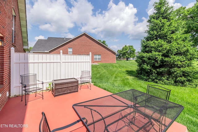 view of patio featuring outdoor dining area