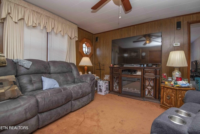 941 Pine Top St, Lenoir City, TN 37772 - carpeted living area with a ceiling fan and wood walls