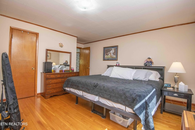 941 Pine Top St, Lenoir City, TN 37772 - bedroom with ornamental molding and light wood-style floors