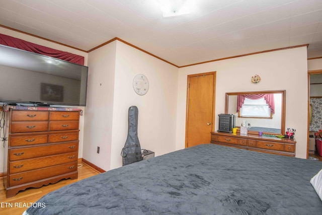 941 Pine Top St, Lenoir City, TN 37772 - bedroom with ornamental molding and light wood finished floors