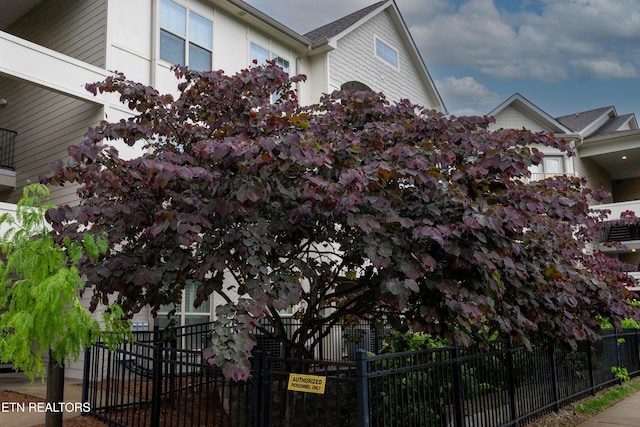 view of home's exterior featuring a fenced front yard
