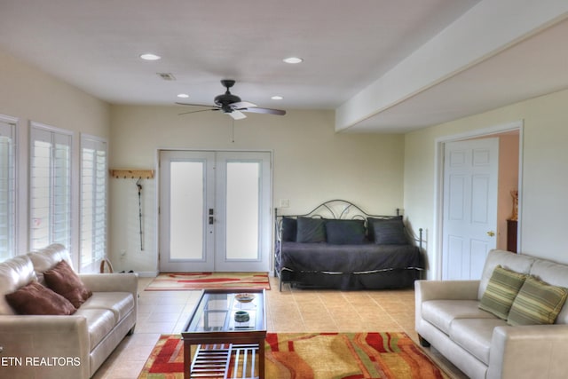 living room with light tile patterned floors, a ceiling fan, and recessed lighting