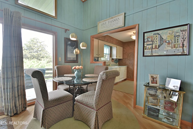 dining room with light wood-type flooring