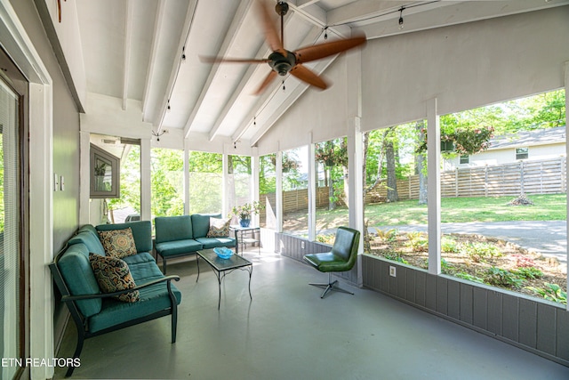 sunroom with outdoor lounge area, beam ceiling, and ceiling fan