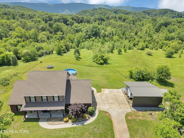 1810 Griffitts Mill Cir, Maryville, TN 37803 - aerial view of property and surrounding area with a heavily wooded area