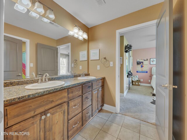 1810 Griffitts Mill Cir, Maryville, TN 37803 - bathroom featuring tile patterned flooring, double vanity, and baseboards