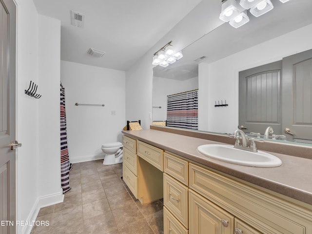 1810 Griffitts Mill Cir, Maryville, TN 37803 - bathroom with toilet, vanity, baseboards, tile patterned flooring, and a shower with shower curtain