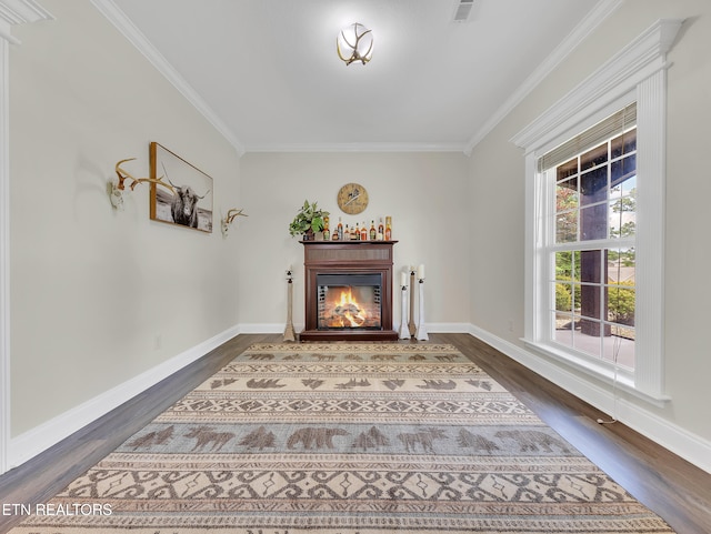 1810 Griffitts Mill Cir, Maryville, TN 37803 - living area featuring dark wood finished floors, ornamental molding, a lit fireplace, and baseboards