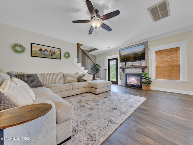 1810 Griffitts Mill Cir, Maryville, TN 37803 - living area with wood finished floors, stairway, a fireplace, ornamental molding, and ceiling fan