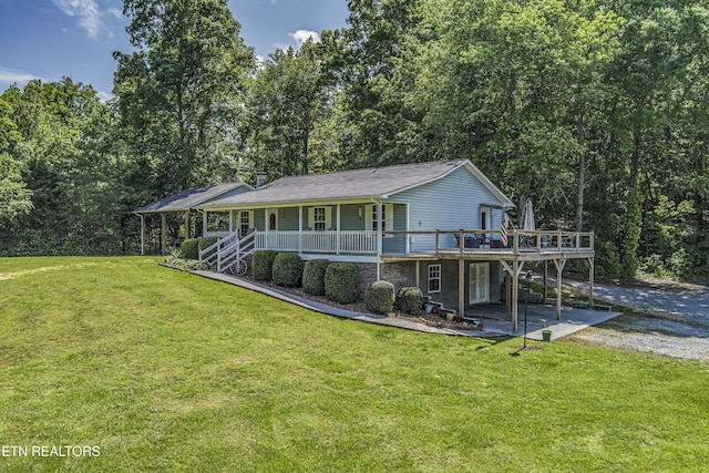325 Correll Ridge Rd, Decatur, TN 37322 - rear view of property with a yard, stairs, a wooden deck, and a view of trees
