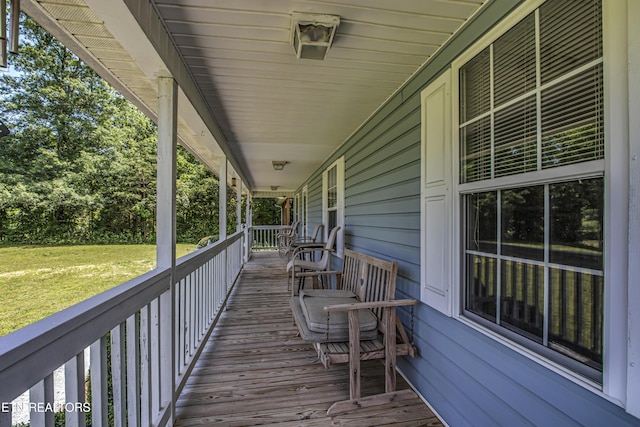 325 Correll Ridge Rd, Decatur, TN 37322 - wooden deck featuring covered porch and a lawn