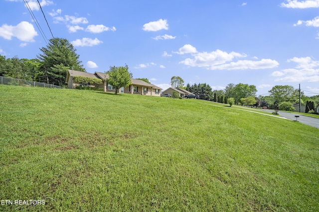 view of yard featuring fence