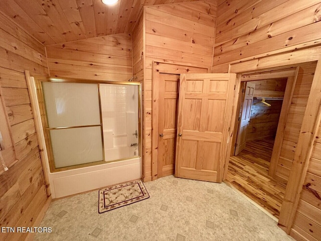 full bath with vaulted ceiling, wooden walls, wooden ceiling, and enclosed tub / shower combo
