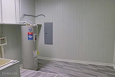 utilities featuring electric water heater and electric panel