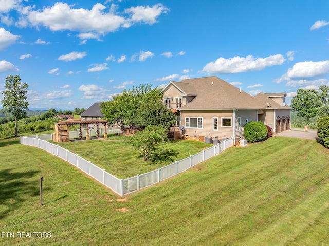 205 Melea Ln, Kingston, TN 37763 - back of property featuring a garage, a gazebo, and driveway