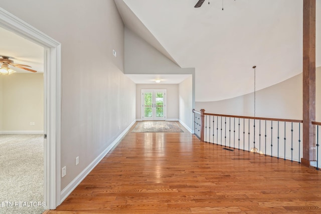 205 Melea Ln, Kingston, TN 37763 - empty room with ceiling fan, lofted ceiling, wood finished floors, and baseboards