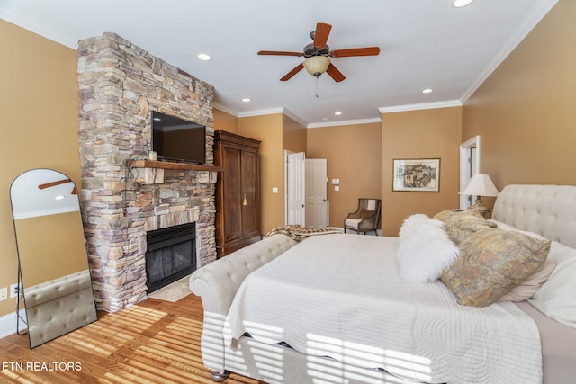 205 Melea Ln, Kingston, TN 37763 - bedroom with recessed lighting, light wood-style flooring, a fireplace, ornamental molding, and a ceiling fan