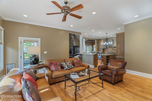 205 Melea Ln, Kingston, TN 37763 - living area with light wood-style flooring, ceiling fan, recessed lighting, ornamental molding, and a chandelier