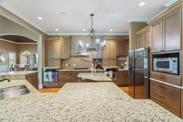 205 Melea Ln, Kingston, TN 37763 - kitchen with stainless steel appliances, a chandelier, a sink, light wood-style flooring, and light stone countertops