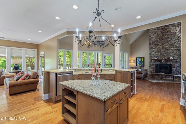 205 Melea Ln, Kingston, TN 37763 - kitchen featuring open floor plan, a large island with sink, stainless steel dishwasher, brown cabinets, and recessed lighting