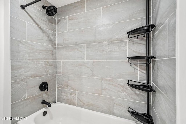 bathroom with shower / bath combination