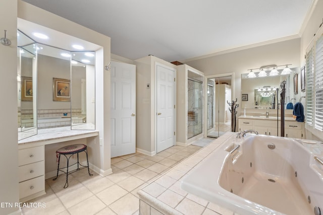 bathroom featuring a tub with jets, tile patterned floors, crown molding, a shower stall, and vanity