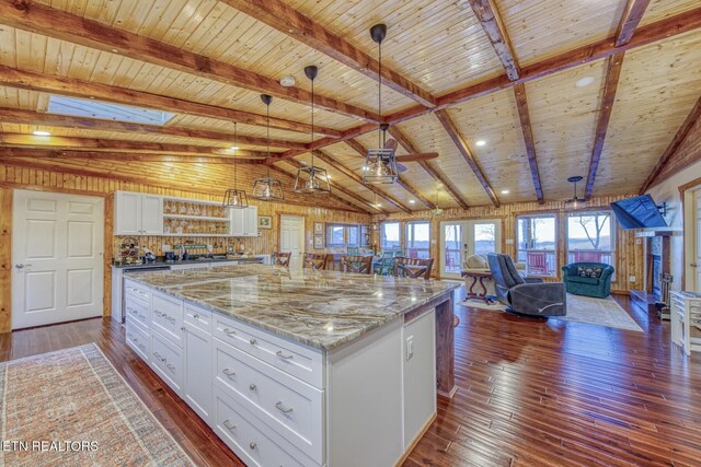 1898 Kennedy Way, Del Rio, TN 37727 - kitchen featuring open floor plan, wood ceiling, white cabinets, a kitchen island, and dark wood finished floors