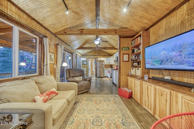 1898 Kennedy Way, Del Rio, TN 37727 - living room featuring wood finished floors, wooden walls, wooden ceiling, and ceiling fan