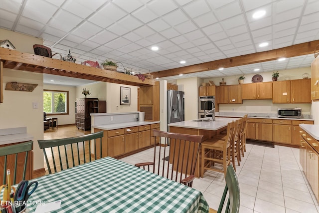 dining space featuring light tile patterned flooring and recessed lighting