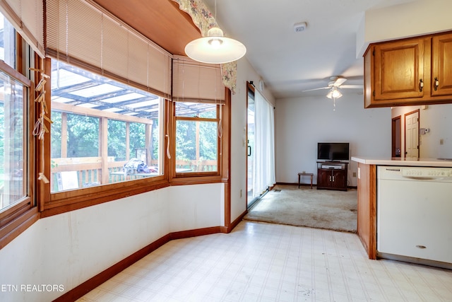375 Rainbow Rd, Sevierville, TN 37862 - kitchen with brown cabinetry, baseboards, a ceiling fan, and dishwasher