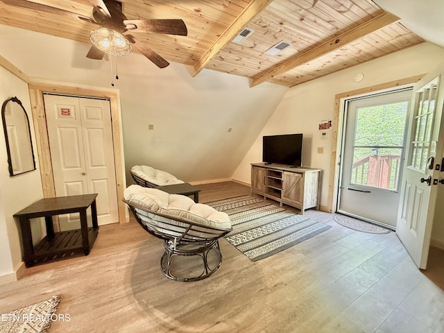 interior space featuring wooden ceiling, beam ceiling, a ceiling fan, and light wood-style floors