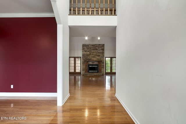 2000 Robinson Dr, Lenoir City, TN 37772 - entrance foyer with wood finished floors, a towering ceiling, baseboards, and a fireplace