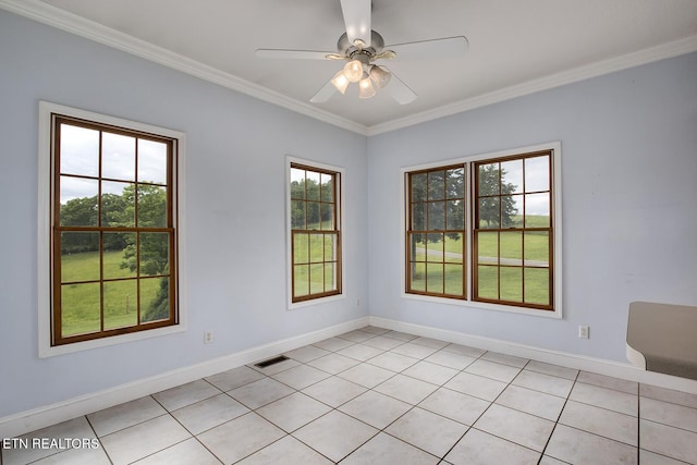 2000 Robinson Dr, Lenoir City, TN 37772 - spare room with ornamental molding, baseboards, ceiling fan, and light tile patterned floors