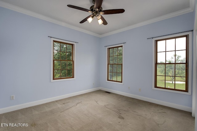 2000 Robinson Dr, Lenoir City, TN 37772 - carpeted spare room featuring crown molding, baseboards, and a ceiling fan
