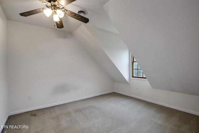 2000 Robinson Dr, Lenoir City, TN 37772 - additional living space with carpet floors, vaulted ceiling, ceiling fan, and baseboards