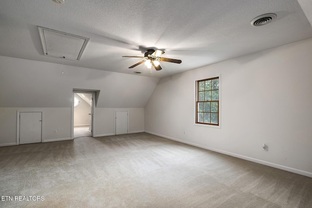 2000 Robinson Dr, Lenoir City, TN 37772 - additional living space featuring attic access, carpet floors, a ceiling fan, baseboards, and vaulted ceiling