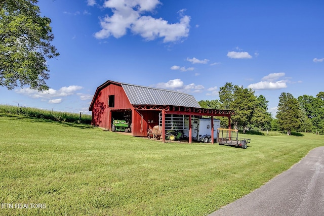 2000 Robinson Dr, Lenoir City, TN 37772 - view of barn with a lawn