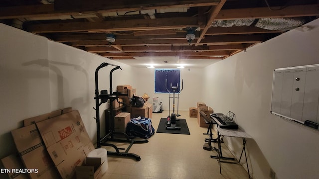 finished basement with tile patterned floors