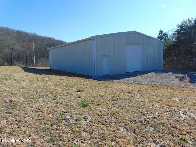 309 Elizabeth Russell Ln, Speedwell, TN 37870 - view of outbuilding featuring an outbuilding