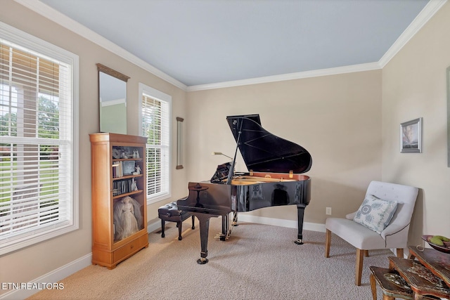 sitting room with carpet flooring, ornamental molding, and baseboards