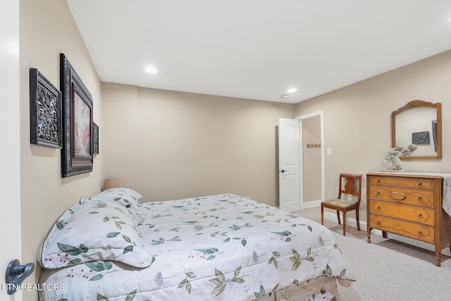 carpeted bedroom featuring recessed lighting and baseboards