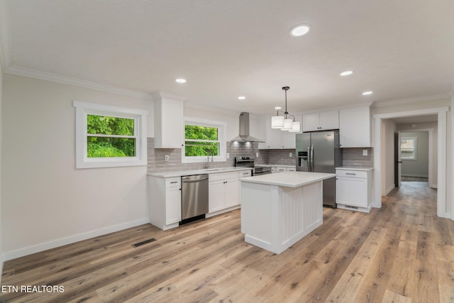 7220 Beelertown Rd, Powell, TN 37849 - kitchen with stainless steel appliances, wall chimney exhaust hood, a sink, decorative backsplash, and baseboards
