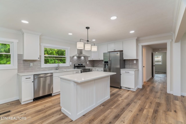 7220 Beelertown Rd, Powell, TN 37849 - kitchen featuring stainless steel appliances, a sink, light countertops, decorative backsplash, and white cabinetry