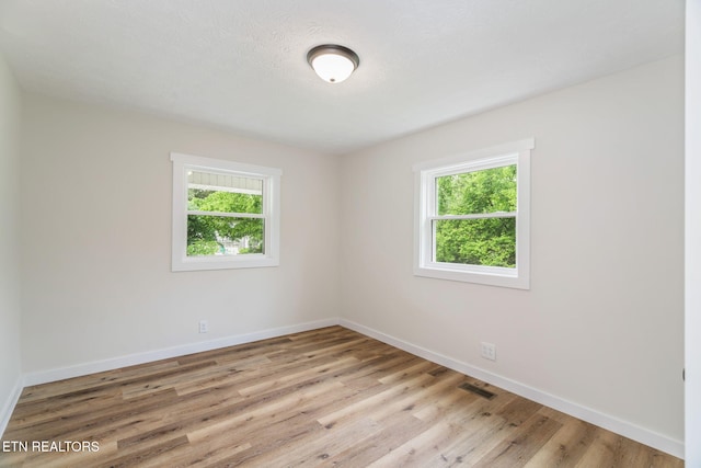 7220 Beelertown Rd, Powell, TN 37849 - spare room featuring baseboards and wood finished floors
