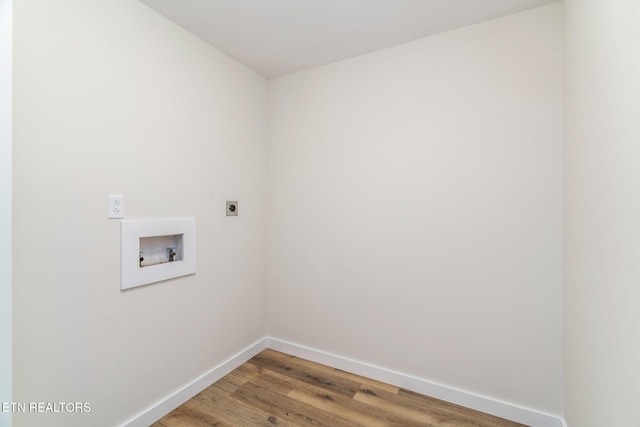 7220 Beelertown Rd, Powell, TN 37849 - laundry room featuring hookup for an electric dryer, baseboards, washer hookup, and light wood-style flooring