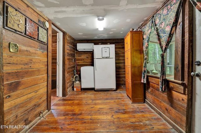 hallway featuring wooden walls and wood-type flooring