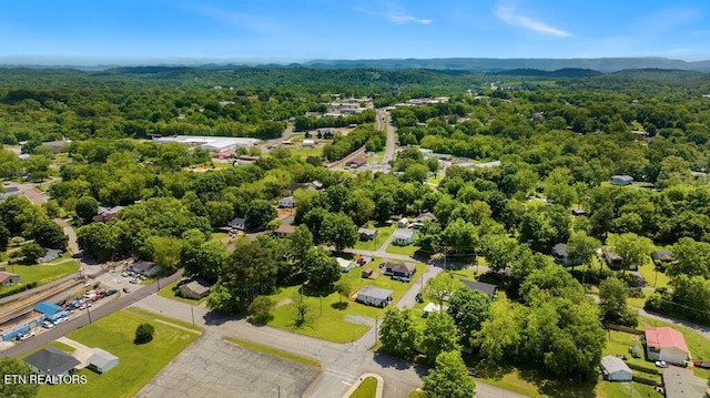 bird's eye view featuring a view of trees