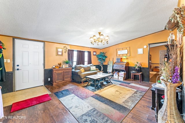 7726 Misty Point Way, Knoxville, TN 37914 - living room with a textured ceiling, a chandelier, crown molding, and wood finished floors