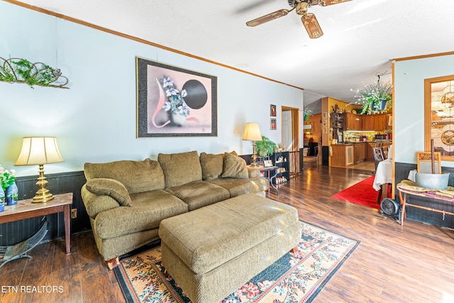 7726 Misty Point Way, Knoxville, TN 37914 - living area with ornamental molding, a ceiling fan, wood finished floors, and a wainscoted wall