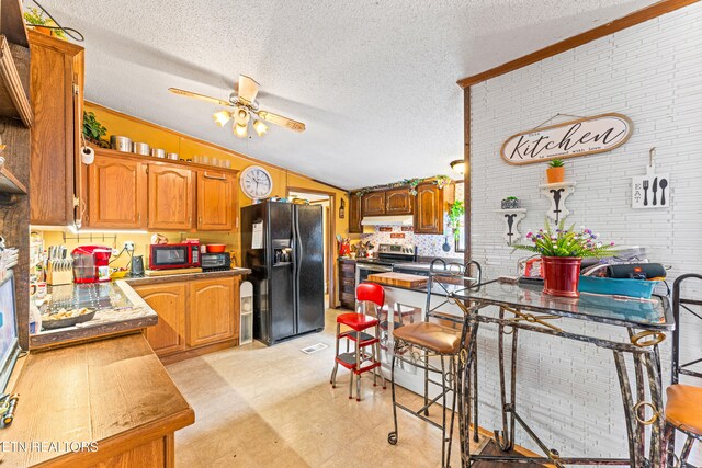 7726 Misty Point Way, Knoxville, TN 37914 - kitchen with black refrigerator with ice dispenser, electric range, a textured ceiling, ceiling fan, and light flooring